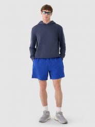 4F Spodenki casual męskie - niebieskie L. Niebieskie szorty męskie 4f, bez wzorów, z dresówki, casualowe. W wyprzedaży za 79.99 zł.
