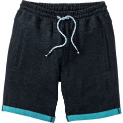 Bermudy dresowe bonprix czarny. Spodnie dresowe męskie marki bonprix. Za 49.99 zł.