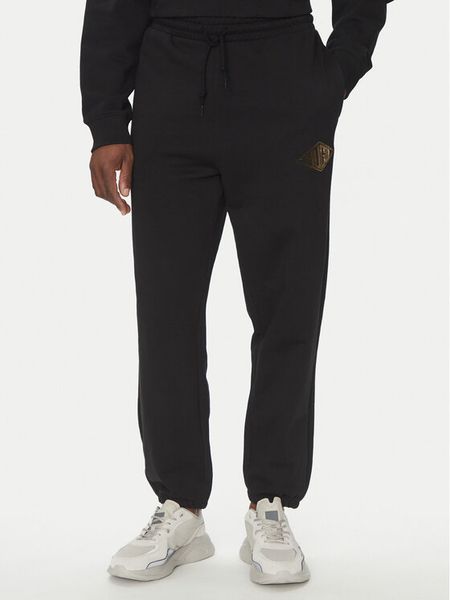 HUGO Spodnie dresowe Dacusi 50534952 Czarny Relaxed Fit. Czarne spodnie dresowe męskie Hugo, bez wzorów, z bawełny. Za 249.99 zł.