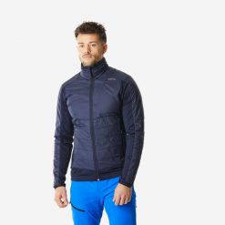 Polar turystyczny męski Quechua MH900 mountain. Niebieskie bluzy z polaru męskie QUECHUA, m, bez wzorów, z materiału, sportowe, bez ramiączek, bez kaptura. Za 229.99 zł.