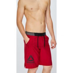 Reebok - Szorty. Czerwone szorty sportowe męskie Reebok, bez wzorów, z poliesteru, sportowe. W wyprzedaży za 119.90 zł.