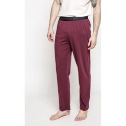 Emporio Armani - Spodnie. Długie spodnie sportowe męskie marki Emporio Armani. W wyprzedaży za 119.90 zł.