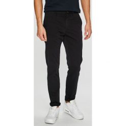 Tommy Hilfiger - Spodnie. Eleganckie spodnie męskie marki Tommy Hilfiger. W wyprzedaży za 319.90 zł.