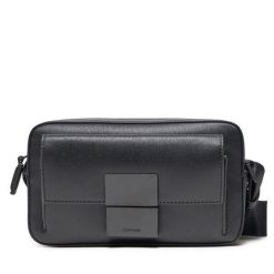 Saszetka Calvin Klein. Czarne saszetki męskie Calvin Klein, bez wzorów, młodzieżowe, małe. Za 509.99 zł.