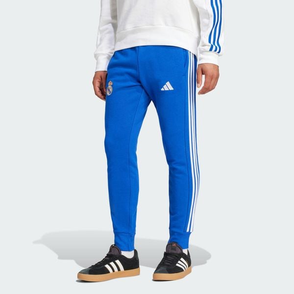 Spodnie Real Madrid DNA. Niebieskie spodnie dresowe męskie ADIDAS, bez wzorów, z dresówki. Za 300.00 zł.