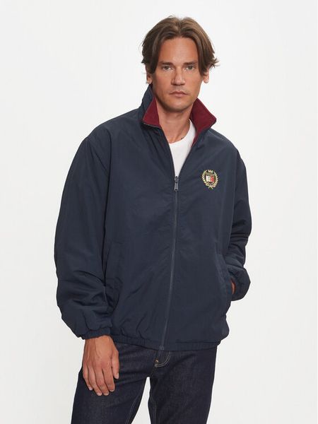 Tommy Jeans Kurtka przejściowa DM0DM19643 Granatowy Regular Fit. Niebieskie kurtki męskie Tommy Jeans, m, bez wzorów, z jeansu, bez ramiączek, bez kaptura. Za 479.99 zł.