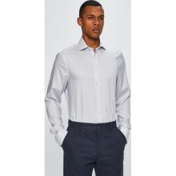 Tommy Hilfiger Tailored - Koszula. Białe koszule męskie Tommy Hilfiger Tailored, bez wzorów, z bawełny, bez kołnierzyka, bez ramiączek. W wyprzedaży za 169.90 zł.