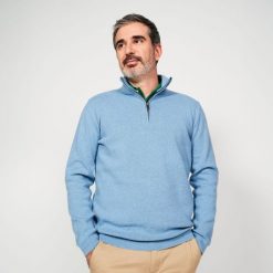 Sweter do golfa męski MW500 z półgolfem. Niebieskie swetry męskie INESIS, bez wzorów, z bawełny, eleganckie, bez kołnierzyka, bez ramiączek. Za 159.99 zł.