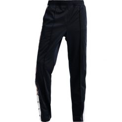 Champion Reverse Weave SPECIAL SEMI DULL Spodnie treningowe navy. Niebieskie długie spodnie sportowe męskie Champion Reverse Weave, z dresówki. Za 359.00 zł.