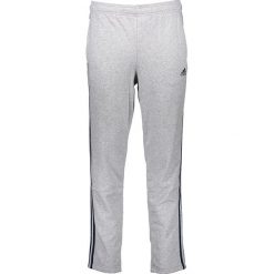 Spodnie dresowe w kolorze szarym. Szare spodnie dresowe męskie marki Nike & adidas, z dresówki. W wyprzedaży za 121.95 zł.