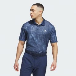 Koszulka polo Ultimate365 Print. Niebieskie koszulki polo męskie ADIDAS, m, bez wzorów, z materiału, sportowe, bez kołnierzyka, bez ramiączek. W wyprzedaży za 173.00 zł.