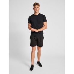 Hummel Koszulka sportowa męska Treningowa Hummel Red Heavy T-Shirt. Czarne t-shirty sportowe męskie HUMMEL, m, bez wzorów, sportowe, bez ramiączek. Za 56.99 zł.