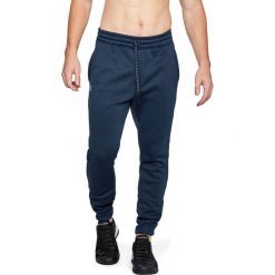 Under Armour Spodnie męskie Storm Armour Fleece Jogger granatowe r. XL (1280742-408). Długie spodnie sportowe męskie marki Under Armour. Za 190.90 zł.