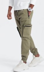 Ombre Męskie spodnie JOGGERY z zapinanymi kieszeniami cargo - jasnooliwkowe V1 OM-PAJO-0135 S. Zielone spodnie dresowe męskie Ombre, bez wzorów. Za 169.99 zł.