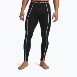Legginsy Under Armour Cold Weather Grid. Czarne legginsy męskie Under Armour, bez wzorów, na fitness i siłownię. Za 179.99 zł.