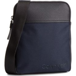 Saszetka CALVIN KLEIN - Vault Flat Crossover K50K504282 068. Saszetki męskie marki Calvin Klein. W wyprzedaży za 279.00 zł.