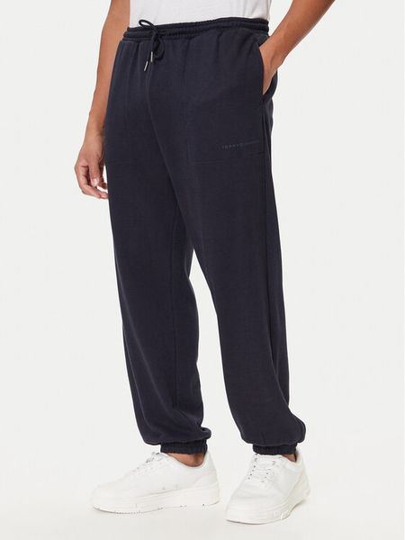 Tommy Hilfiger Spodnie dresowe UM0UM03627 Niebieski Regular Fit. Niebieskie spodnie dresowe męskie Tommy Hilfiger, bez wzorów, z bawełny. Za 229.99 zł.