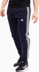 Adidas Spodnie męskie adidas Essentials French Terry Tapered Cuff 3-Stripes granatowe IC9406 2XL. Długie spodnie sportowe męskie ADIDAS, bez wzorów. Za 182.12 zł.
