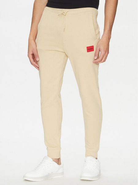 HUGO Spodnie dresowe Doak212 50447963 Beżowy Regular Fit. Brązowe spodnie dresowe męskie Hugo, bez wzorów, z bawełny. Za 329.99 zł.