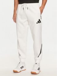 Adidas Spodnie dresowe Z.N.E. JF2449 Biały Regular Fit. Białe spodnie dresowe męskie ADIDAS, bez wzorów, z bawełny. Za 279.99 zł.