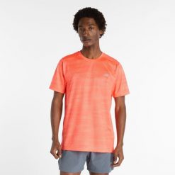 Koszulka męska New Balance MT53217URR – pomarańczowa. Brązowe t-shirty sportowe męskie New Balance, m, bez wzorów, z materiału, sportowe, bez ramiączek. Za 139.99 zł.