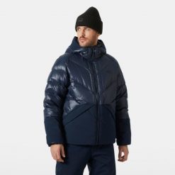 Kurtka puchowa Helly Hansen Village Down. Niebieskie kurtki męskie Helly Hansen, m, bez wzorów, z puchu, bez ramiączek, bez kaptura. W wyprzedaży za 1,398.50 zł.