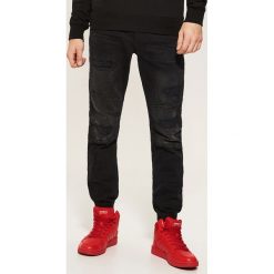 Denimowe joggery - Czarny. Czarne jeansy męskie House, z jeansu. Za 139.99 zł.