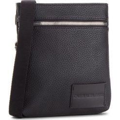 Saszetka CALVIN KLEIN JEANS - Pebble Essential Mic K40K400660 001. Saszetki męskie marki Calvin Klein Jeans. W wyprzedaży za 249.00 zł.