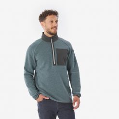 Sweter turystyczny męski Quechua NH500. Niebieskie swetry męskie QUECHUA, bez wzorów, z bawełny, sportowe, bez kołnierzyka, bez ramiączek. Za 129.99 zł.