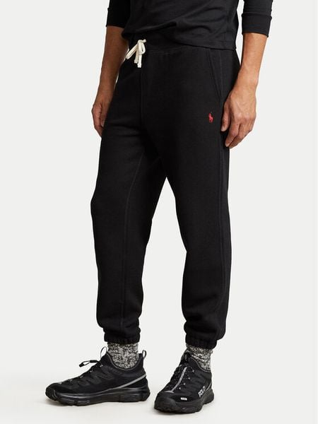 Polo Ralph Lauren Spodnie dresowe 710793939001 Czarny Relaxed Fit. Czarne spodnie dresowe męskie Polo Ralph Lauren, bez wzorów, z dresówki. Za 639.99 zł.