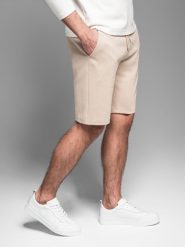 Casualowe szorty męskie SLIM FIT z dzianiny żakardowej beżowe V2 OM-SRCS-0168 S. Brązowe szorty sportowe męskie Ombre, bez wzorów, z dzianiny, sportowe. Za 196.65 zł.