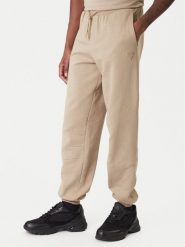 Guess Spodnie dresowe Z6RB03 K9YI1 Beżowy Regular Fit. Brązowe spodnie dresowe męskie Guess, z aplikacjami, z bawełny. Za 349.99 zł.