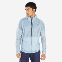 Lekka kurtka turystyczna męska Quechua MH900. Niebieskie kurtki softshell męskie QUECHUA, l, bez wzorów, z materiału, bez kaptura, trekkingowe. W wyprzedaży za 89.99 zł.