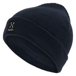 Czapka Haglöfs Malung. Niebieskie czapki męskie Haglöfs, bez wzorów, klasyczne. Za 263.50 zł.