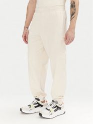 EA7 Emporio Armani Spodnie dresowe 7M000154 AF10432 U1079 Écru Regular Fit. Spodnie dresowe męskie EA7 Emporio Armani, bez wzorów, z bawełny. Za 279.99 zł.