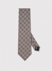 PAKO LORENTE – Beżowy krawat w kwiaty. Brązowe krawaty i muchy męskie Pako Lorente, bez wzorów, z poliesteru, biznesowe. Za 99.99 zł.