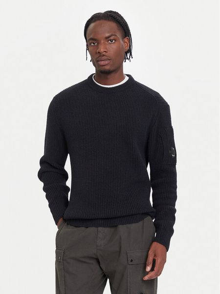 C.P. Company Sweter 19CMKN307A006170A Czarny Regular Fit. Czarne kardigany męskie C.P. Company, bez wzorów, z syntetyku, bez kołnierzyka, bez ramiączek. Za 879.00 zł.