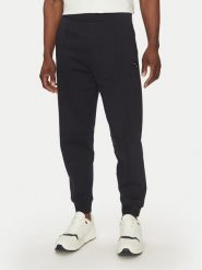 Armani Exchange Spodnie dresowe XM000472 AF13109 UB101 Granatowy Regular Fit. Niebieskie spodnie dresowe męskie Armani Exchange, bez wzorów, z bawełny. Za 349.99 zł.