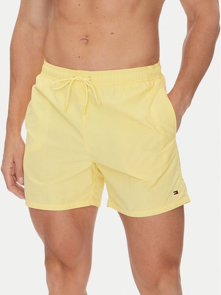 Tommy Hilfiger Szorty kąpielowe UM0UM03477 Żółty Regular Fit. Żółte kąpielówki męskie Tommy Hilfiger, bez wzorów, z syntetyku. Za 169.99 zł.