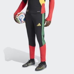 Spodnie treningowe Tiro Jamajka 26 x Bob Marley. Czarne długie spodnie sportowe męskie ADIDAS, bez wzorów, do piłki nożnej. Za 279.00 zł.
