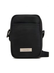 Calvin Klein Saszetka Sleek Slim Reporter LV04D3233G Czarny. Czarne saszetki męskie Calvin Klein, bez wzorów, z materiału. Za 289.99 zł.