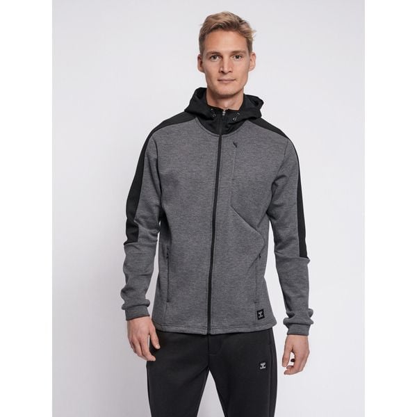 Bluza fitness męska Hummel hmltropper zip z kapturem. Niebieskie bluzy nierozpinane męskie HUMMEL, bez wzorów, bez zapięcia, na fitness i siłownię. W wyprzedaży za 211.00 zł.
