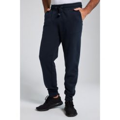 Męskie Spodnie dresowe ściągane sznurkiem nowoczesny krój do roz. 8XL. Niebieskie spodnie dresowe męskie JAY-PI, bez wzorów, z bawełny, długie. Za 239.99 zł.