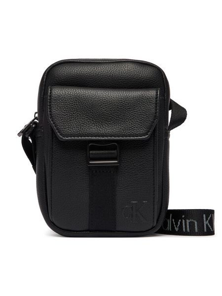 Calvin Klein Saszetka Webbing Strap Slim Reporter LV04D3281G Czarny. Czarne saszetki męskie Calvin Klein, bez wzorów, ze skóry. Za 329.99 zł.