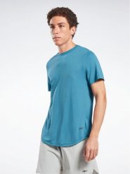 Reebok T-Shirt ACTIVCHILL+DREAMBLEND T-Shirt HR6167 Niebieski Regular Fit. Niebieskie t-shirty sportowe męskie Reebok, l, bez wzorów, sportowe, bez ramiączek. Za 109.99 zł.