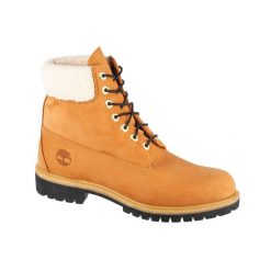 Buty zimowe męskie, Premium 6 In WP Boot. Żółte buty trekkingowe męskie Timberland, na zimę, bez wzorów, z gumy, sportowe, bez obcasa, bez zapięcia. Za 883.00 zł.