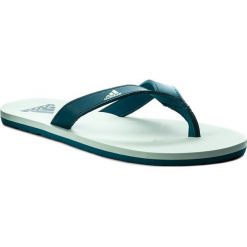 Japonki adidas - Eezay Essence CG3553 Ashgrn/Reatea/Ashgrn. Zielone klapki i japonki męskie ADIDAS, bez wzorów, z materiału. W wyprzedaży za 79.00 zł.