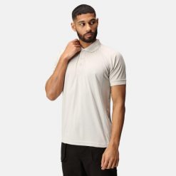 Koszulka polo robocza męska Coolweave. Szare koszulki polo męskie Regatta, m, bez wzorów, sportowe, bez kołnierzyka, bez ramiączek. W wyprzedaży za 84.99 zł.