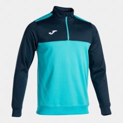 Bluza Joma Winner. Niebieskie bluzy nierozpinane męskie Joma, bez wzorów, eleganckie, bez ramiączek, bez kaptura. W wyprzedaży za 148.55 zł.