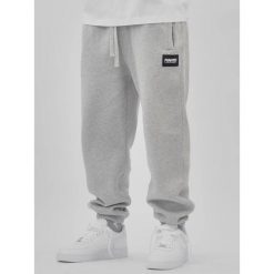 MANTO spodnie dresowe LABEL 25 melanż. Szare spodnie dresowe męskie Manto, bez wzorów, z dresówki, długie. Za 269.00 zł.